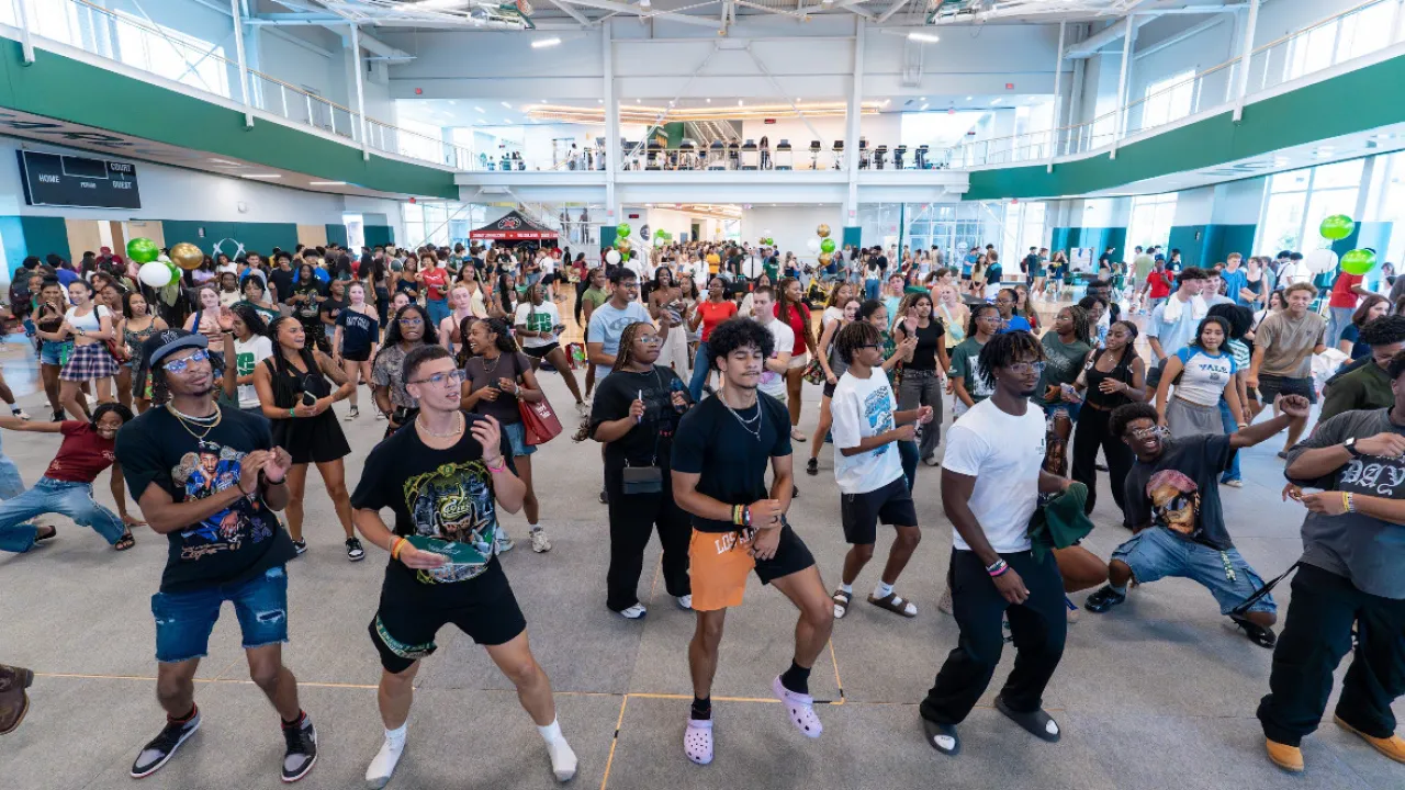 Students dancing in the University Recreation Center during RecFest. 